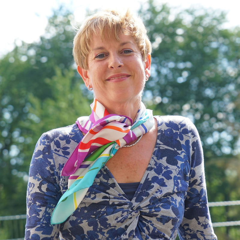 Qualities scarf tied around the neck